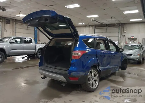 2017 Ford Escape Titanium из США, поврежденный, VIN 1FMCU9J9XHUA97789